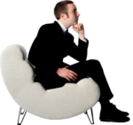 Скачать PNG картинку на прозрачном фоне Мужчина в костюме сидит в мягком кресле, задумчивый